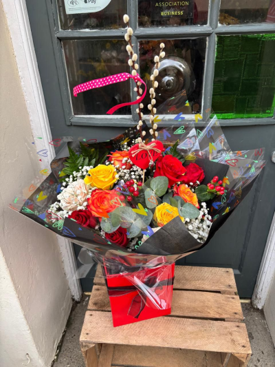 Sweet Romance - A bouquet of mixed beautiful roses is sure to create a lasting impression.